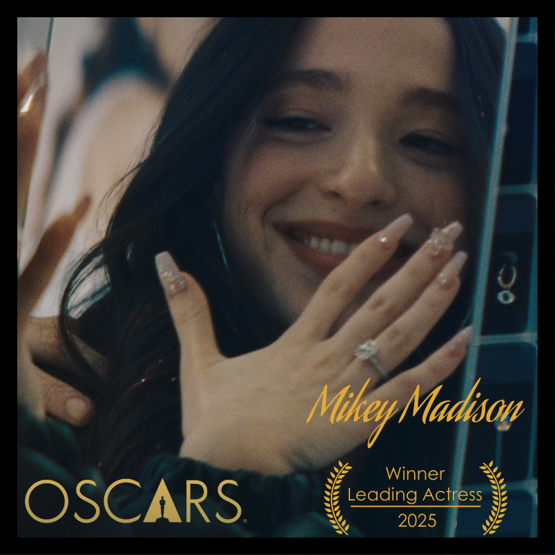 "Mikey Madison smiling after winning the Academy Award for Best Leading Actress 2025"